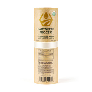 Partnered Process Partnered Proof broad spectrum hemp oil 2500mg cardboard tube packaging with supplement facts label.